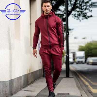 China Anti-UV OEM Custom Design Sports Tracksuit Men's Slim Fit Polyester Tracksuit for sale