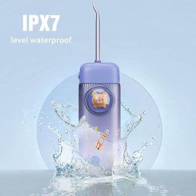 China Outdoor Rechargeable Dental Water Flosser IPX7 Waterproof Portable Travel Use Oral Irrigator For Kids for sale