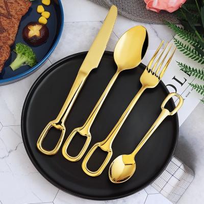 China Sustainable Hanging Cutlery Set SUS304 Stainless Steel Eating Utensils From Knife Fork Server Flatware To Gold Spoon With Hole Hanging Handles for sale