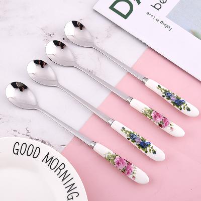 China Viable Wholesale Ceramic Handle Rose Flower Pattern Ice Cream Spoon Stainless Steel Honey Coffee Ice Cream Mixing Spoon for sale