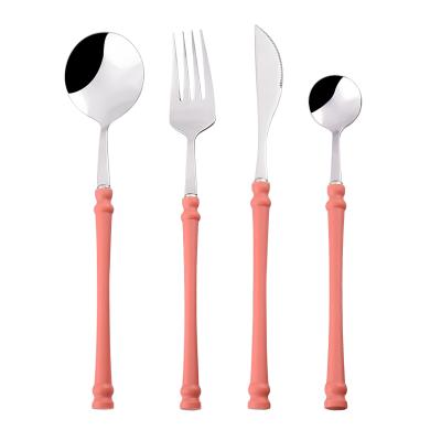 China Viable Wholesale Restaurant Used Stainless Steel Flatware Set Fork Spoon Knife With Colored Plastic Handle for sale