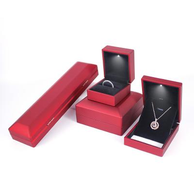 China Custom Made Box Eco-friendly Durable LED Logo Jewelry Box Wedding Gift Ring Display Box Light Necklace Bracelet Jewelry Set Box for sale