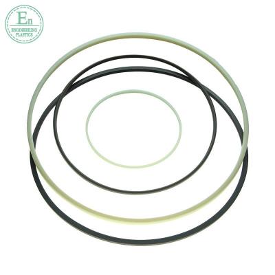 Cina Oil Resistant Hydraulic Cylinder Wear Plastic Rings To Seal Custom Hydraulic Self Lubricating Guide Ring Seals in vendita