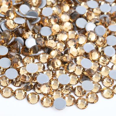 China Wholesale SS3-SS30 Flatback Light Topaz Color Iron On Crystal Rhinestone Glass Stones Hotfix Rhinestone For DIY Bags for sale