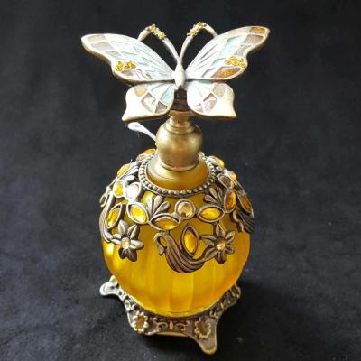 China Personal Care Flower Decorated Yellow Color Pumpkin Shape Perfume Glass Bottle 30ml With Metal Stick Cap For Gift Use for sale