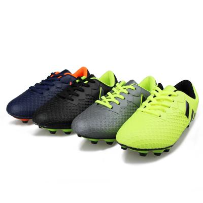 China Professional Cheap TPR Soccer Shoes Boys Indoor Outdoor Soccer Athletic Shoes for sale