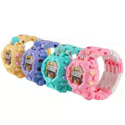 China Hot Selling Children Watch Transformation Toys for Kid Fashion Interesting Girl Boy Transformed Electronic Children's Watch Boy Girl Cartoon Toy Birthday Gift robot for sale