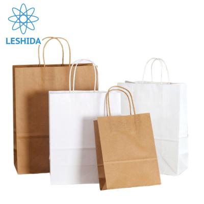 China Recyclable Custom Logo Print Wholesale Coated Paper Paper Bag White Shopping Gift Bags for sale