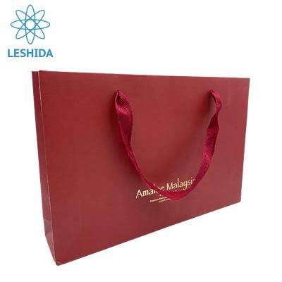 China Recyclable Luxury Custom Printed Matt Laminated Shopping Gift Paper Bag For Jewelry Bag Packaging With Logo for sale