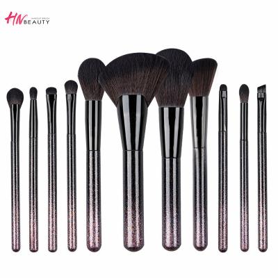 China Angular Blush 11pcs Glitter Makeup Brush Shiny Netting Set With Customized Bag for sale