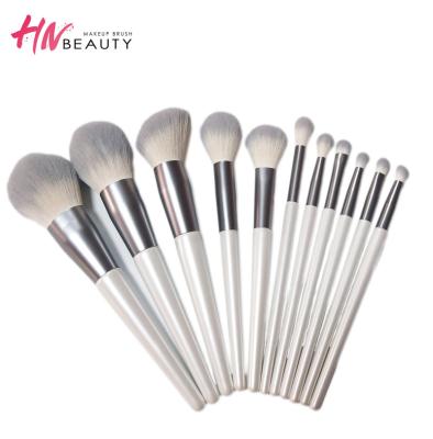 China Angular Blush Dense Kits Customized Gray Hair Makeup Brush Set White Handle Beauty 11pcs With Bag Custom Made for sale