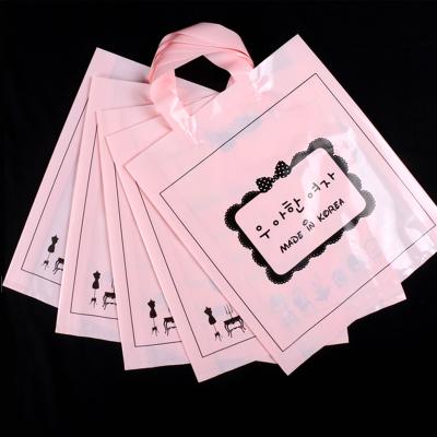 China Recyclable Cute Pink Korean Handwriting Logo Custom Plastic Girl Clothes Die Cut Packaging Bags Handbags for sale