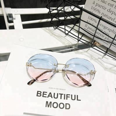 China Fashion Sun Glasses Sinle Transparent Round Frameless Vintage Round Rimless Sunglasses for sale