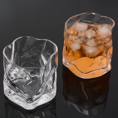 China Modern Custom Logo Home Factory Price Whiskey Shot Glass Irregular Crystal Clear Glass Mug for sale