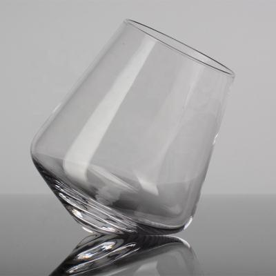 China Whiskey Wine Shot Glass Modern High Quality Multifunctional Tilted Tipping Glass Chubby Cup for sale