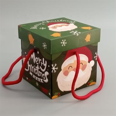 China Recyclable Custom Gift Box Christmas Gift Packaging Box With Handle for sale