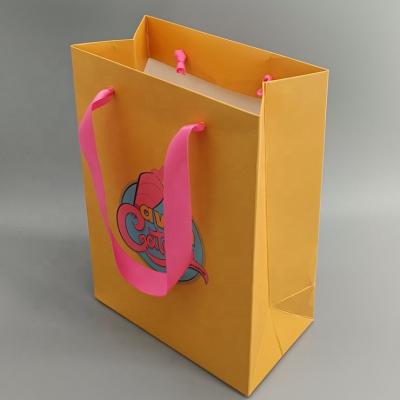 China Recyclable Custom Luxury Printing Shopping Paper Bag With Logo For Apparel Packaging for sale