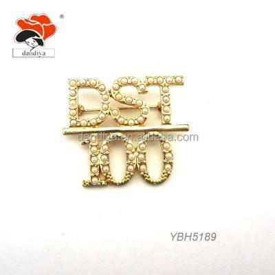 China Wholesale ALLOY Fashion Custom Design Golden Letter DST 100 Pearl Brooch for sale