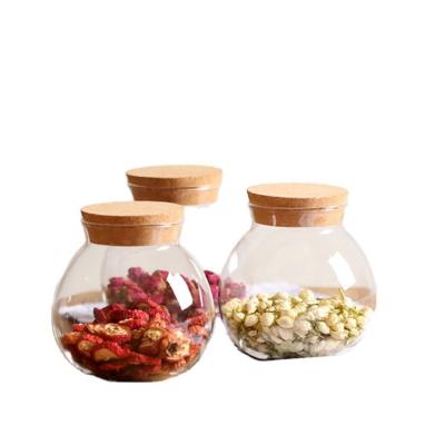 China Keeping Fresh Round Airtight Borosilicate Glass Storage Food Jar With Bamboo Wood Lid for sale