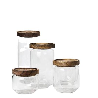 China Hot Sale Freshness Preservation Clear Borosilicate Glass Storage Bottles With Bamboo Lid Personalized Food Nuts Glass Jars Containers For Food Storage for sale