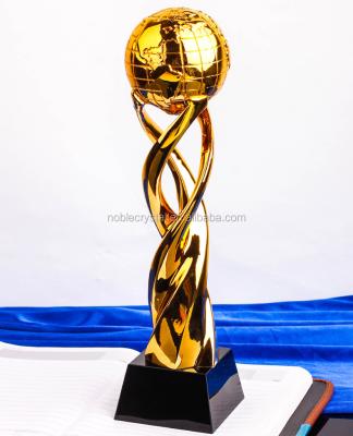 China New Europe Design Resin Gifts Gold Color Globe Resin Trophy Awards for sale