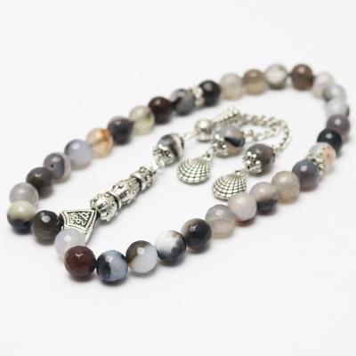 China Wholesale Middle East Muslim 33 Crystal Agate Prayer Beads Bracelet Alloy Black And White Tassel For Women Men for sale