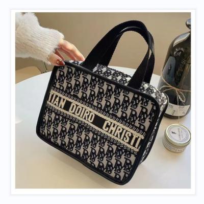 China Wholesale Eco-friendly Superior Portable Plaid Makeup Bag High Quality Hot Selling Custom designer luxury high quality retro bag for sale