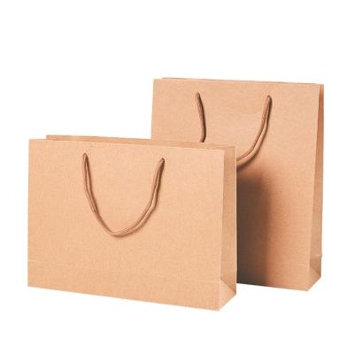 China Christmas Gift Kraft Paper Bags Gift Anti-Bend Shopping Biodegradable Packaging Take Out Paper Bag With Handle for sale