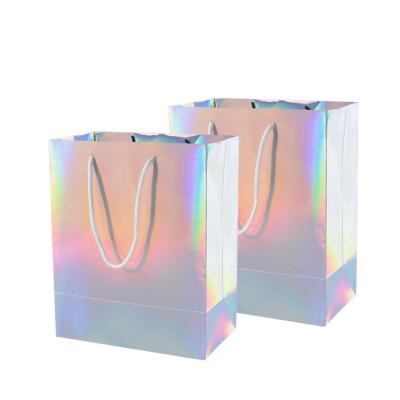 China Recycled Materials Manufactures Custom Colorful Christmas Gift Hardcover Rainbow Bags Laser Holographic Paper Bag For Cosmetic Jewelry Gift Packaging for sale