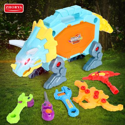 China Preschool Kids Play Set Children Suitcase Toy Kit Dinosaur Toolbox Diy Toys Set with Lights & Sounds for sale