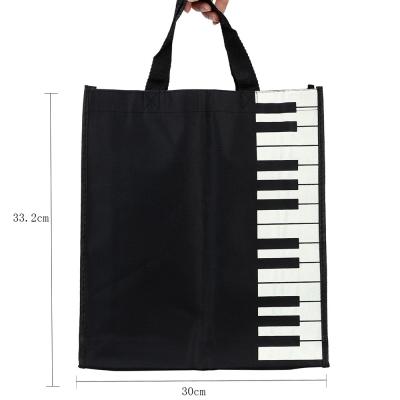 China Fashion Piano Handled Keys Design Music Handbag, Cute Tote Shopping Bag, Canvas Bag With PP Strap Handle for sale