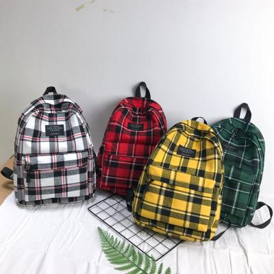 China Backpack men women checkerboard plaid print grid print backpack travel daypack students schoolbag for sale