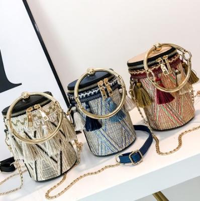 China High Quality Natural Bucket Bag Waterproof Straw Shoulder Bag For Girls And Women for sale