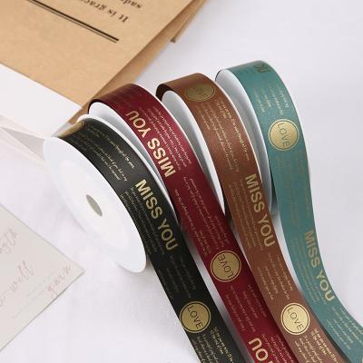 China 3 cm Width PP Gift Double Side Printing Plastic Ribbon With Printing Used For Gift Wrapping, Floral Bouquet, Box Wrapping Daily Ribbon Decoration for sale