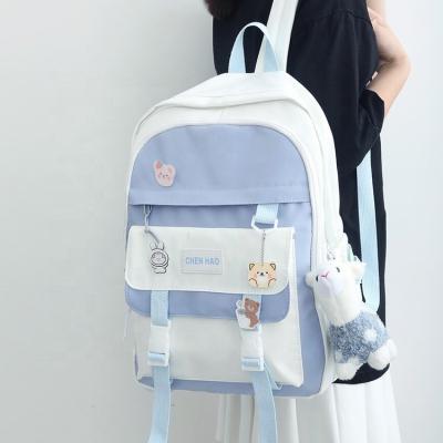 China New large capacity female children's school bag backpack teens colorful fashion cute anti-theft contrast premiere with alpaca pendant for sale