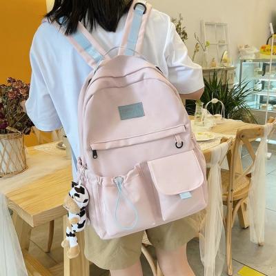 China Wholesale Anti-theft Colorful Fashion Colorful Soft Teens Pouch Drawstring Kids Large Messenger School Bag Backpack With Cow Hairy Pendant for sale