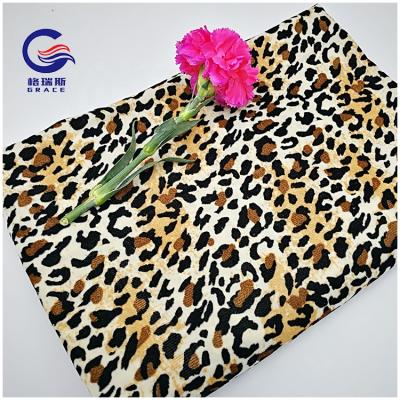 China Anti-Static Woven Polyester Leopard Print Velvet For Women's Dress for sale