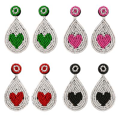 China BOHEMIA 2022 New Design Multicolor Seed Beaded Earrings Retro Heart Shaped Bohemian Rice Beads Earrings Handmade Beaded Earrings for sale