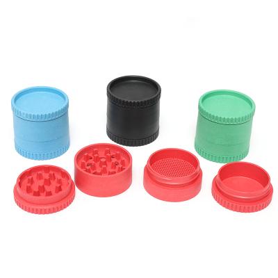 China Smoking Accessories Wholesale Custom Biodegradable Tobacco Grinder 4 Layer Degradable Plastic Herb Grinder for sale