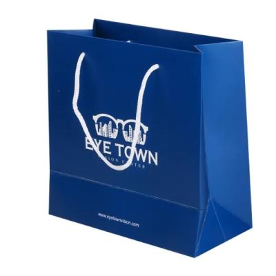 China Handmade Custom Printed Luxury Kraft Paper Shopping Gift Paper Bag With Logo for sale