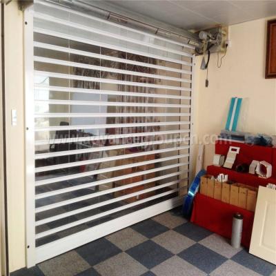 China Transparent Rolling Electric Commercial Polycarbonate Roll Up Door for sale