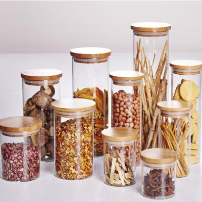 China Viable Airtight Tea Tin Canister Canisters Glass Storage Jar With Bamboo Lid Packaging For Tea Wholesale for sale