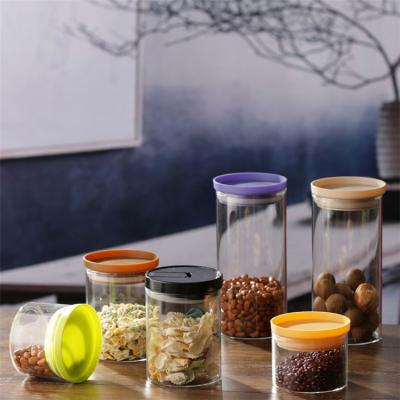 China Sustainable Storage Food Jar Glass Bottles With Colored Plastic Lid For Household for sale