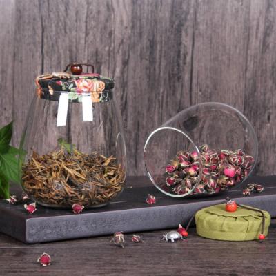 China Sustainable heat resistant handmade mouthblown glass food storage jar with cork lid for sale