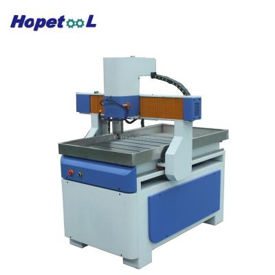 China Economic Building Material Stores CNC 6090 Mold Engraving Machine for sale