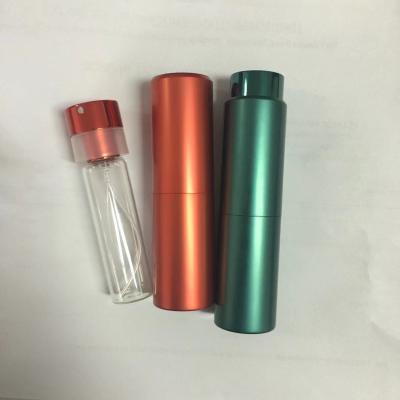 China Personal Skin Care Aluminum Perfume Spray Bottle Twist Up Type 20ml Travel Bottle Perfumes Purple Red Green Rose Gold for sale