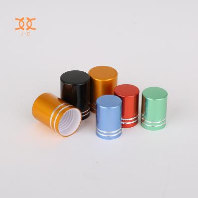 China Child Safe Aluminum Material Plastic Inserts Metal Lid Essential Oil Capsule Screw Cap for sale