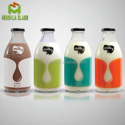 China High Quality Empty Round Shape 500ml 50cl 16oz Milk Bottle Glass Milk Bottles With Metal Lid for sale