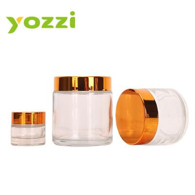 China 50 to 100ml Cosmetic Sensitive Gold Bottle Cover Cream Eye Cream Jar Portable Travel Cosmetics Jars for sale