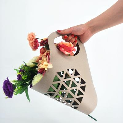 China Flower Moisture-proof Whole Paper Selling Making Carry Bag, Flower Paper Packaging Carry Bag, Gift Bag for sale